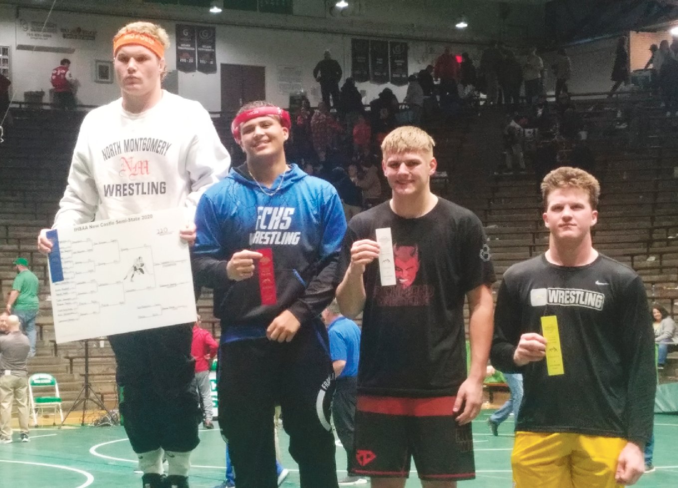 North Montgomery's Drew Webster stood atop the podium for a second-straight year at the New Castle wrestling semi-state on Saturday.