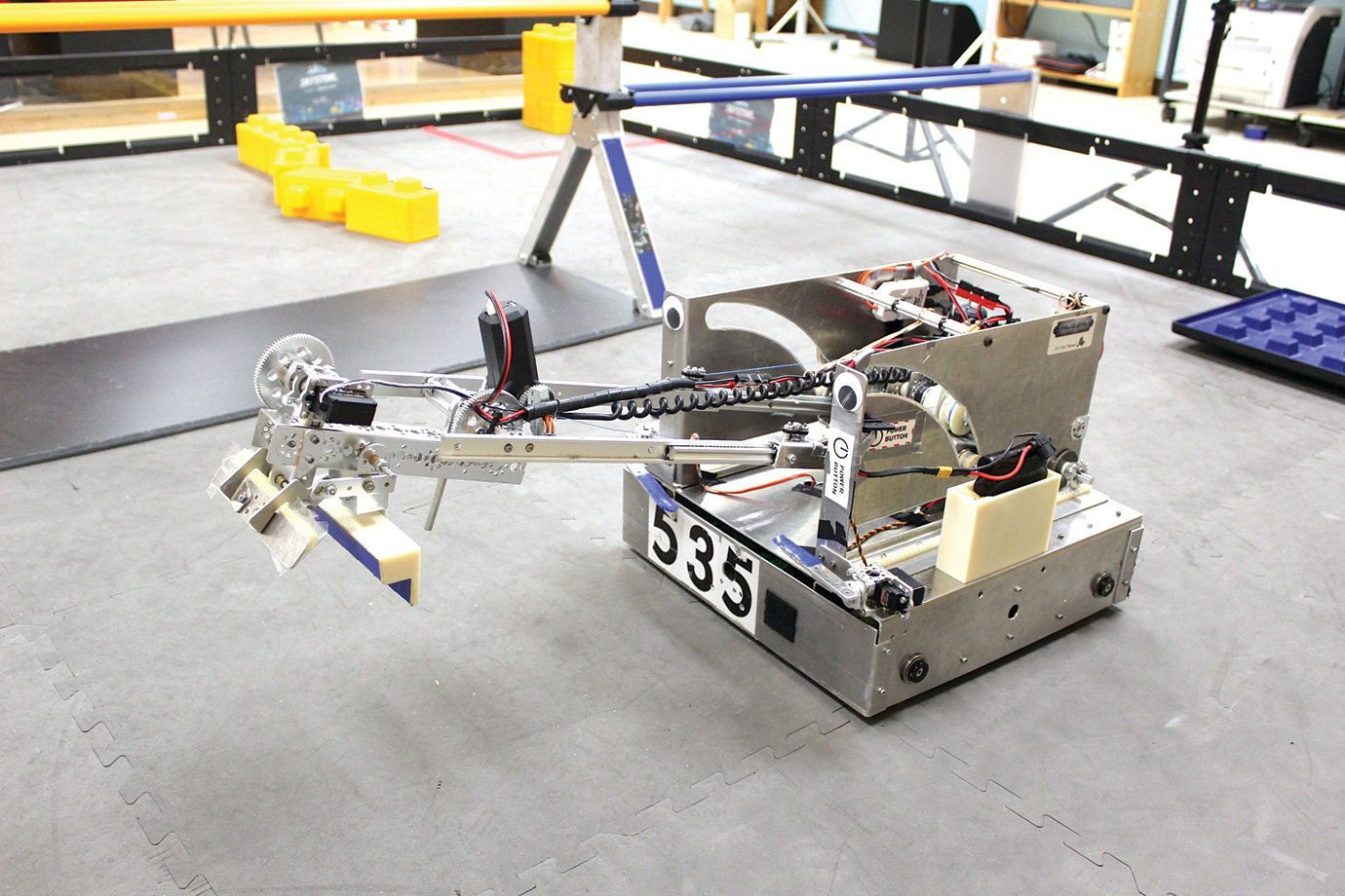 The TOBOR robotics team at Crawfordsville High School have put together a complex, mobile piece of machinery, seen here in what members call the "field" where they can put their designs into practice.