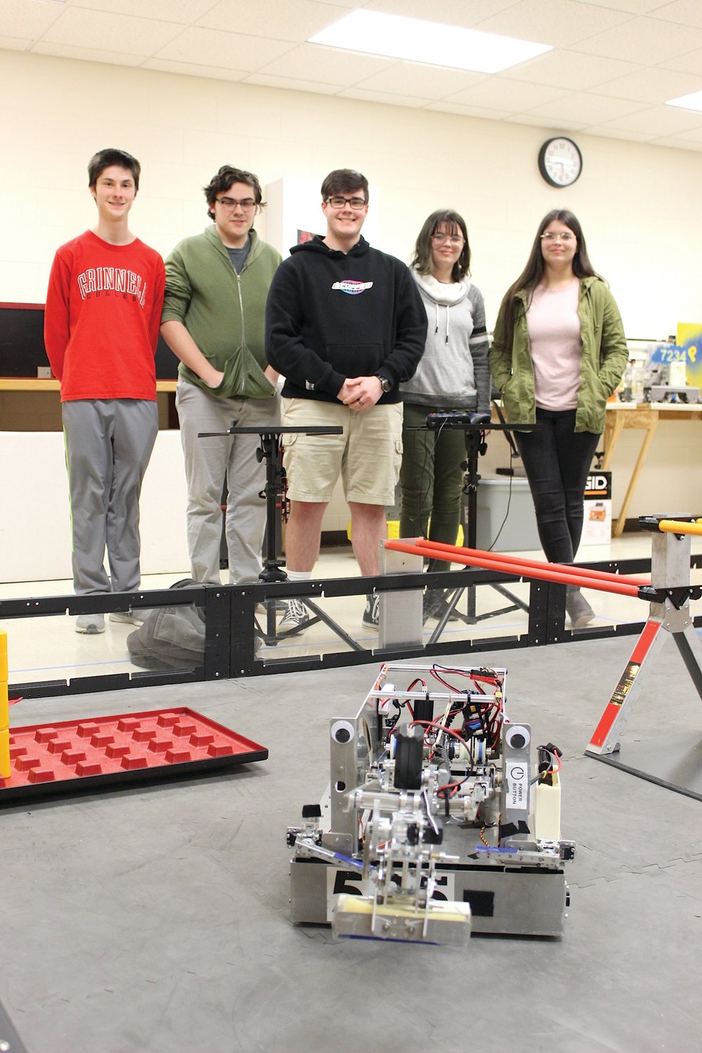 Members of the varsity-like TOBOR robotics team at Crawfordsville High School perform some maneuvers with their designs Tuesday. Members include Luka Mikek, from left, Tayden Morgan, Ian Conkright, Evie Redding and Gwyn Redding.