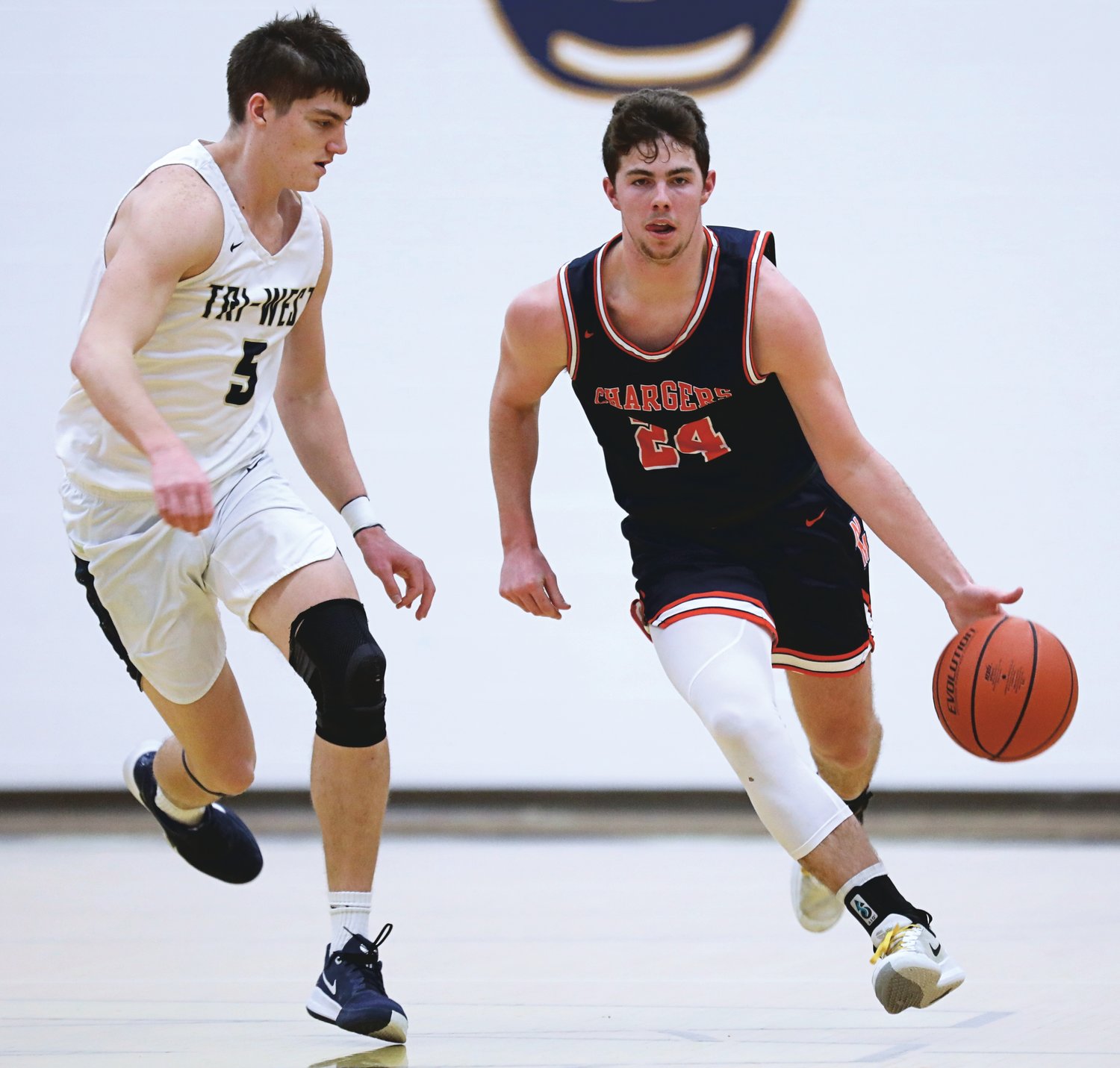 North Montgomery's Alex Wallace led the Chargers with 16 points in a 77-60 loss at Tri-West on Friday.