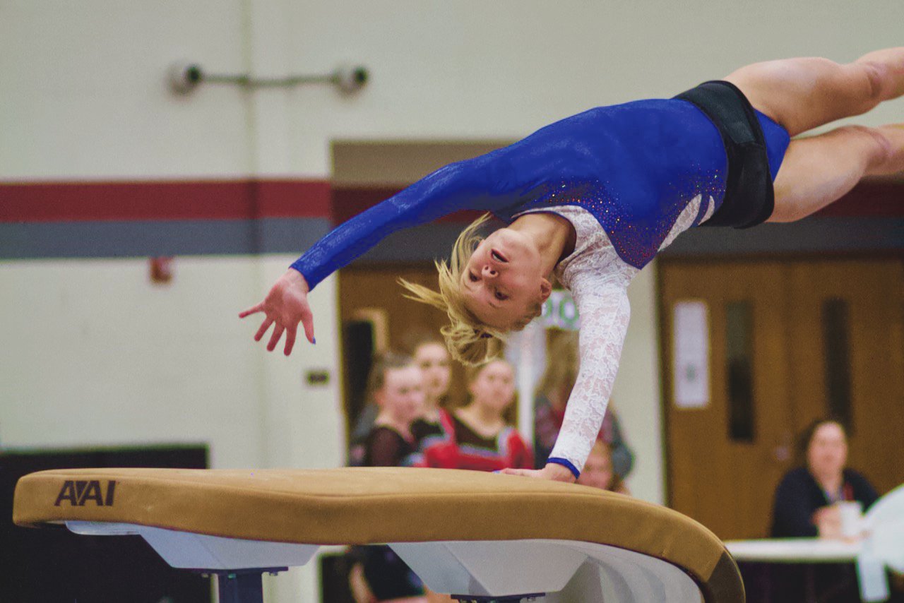 Crawfordsville's Abbie Lain helped lead the Athenians to the county gymnastics title on Monday night. The freshman won the all-around, and recorded a score of 8.75 on the vault.