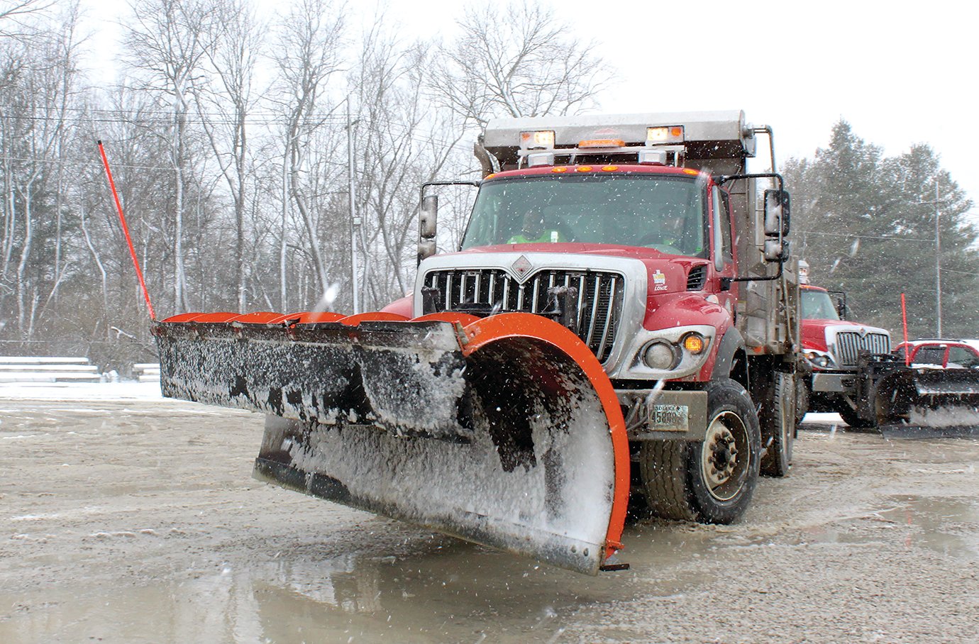 A Montgomery County Highway Department snow plow heads into action.