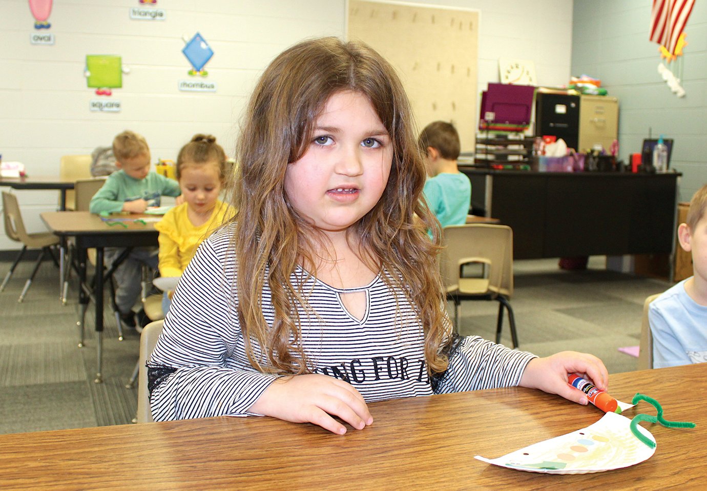 Little Mountie preschooler Paislie Barnes investigates the scene Thursday at New Market Elementary.