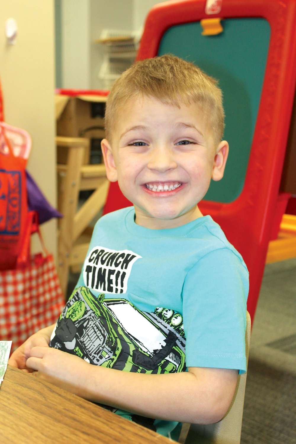 Zane Turner, Little Mountie Preschool student, puts on a big smile after it was revealed newspaper readers would see his photo.