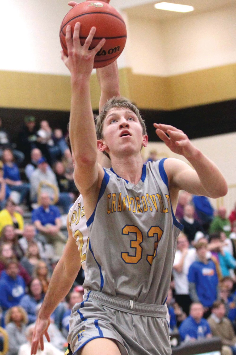 Ian Hensley of Crawfordsville scores two of his team-high 21 points on the night on this second-quarter lay-up against Covington...Covington defeated Crawfordsville 75-68 in overtime.