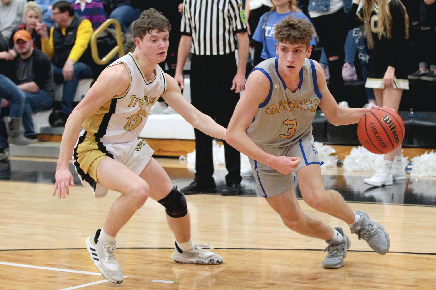 Ty Lynas of Crawfordsville heads toward the paint after getting past Daniel Keller of Covington...Covington defeated Crawfordsville 75-68 in overtime.