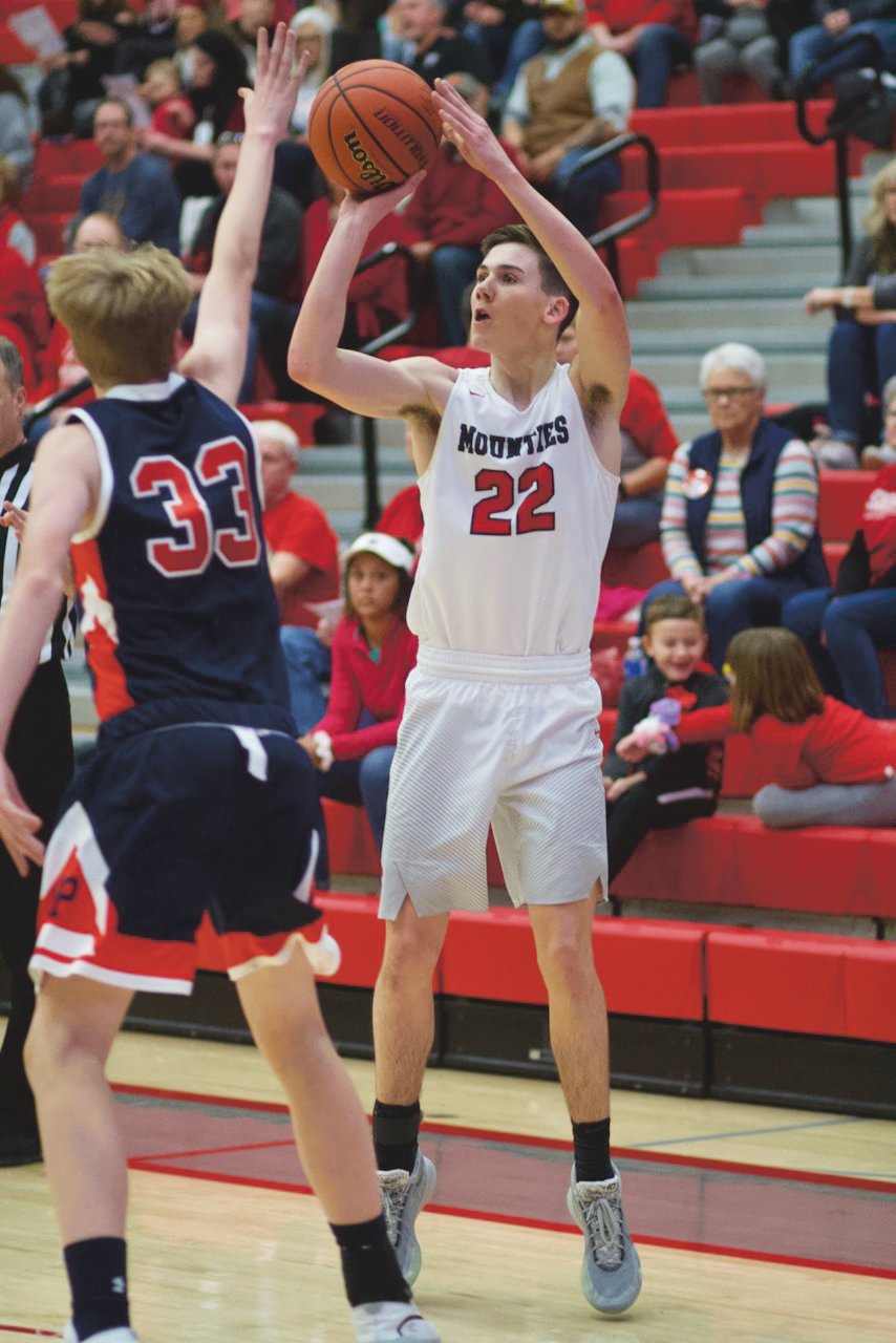 Southmont's Logan Oppy fires up a 3-pointer last season. Oppy led the Mounties with 14 points in their season opener against Cloverdale on Saturday.