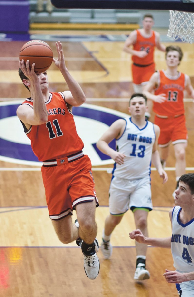 North Montgomery's Jaron Bradford drives in for a layup in the Chargers' 49-46 win over Frankfort on Friday night.