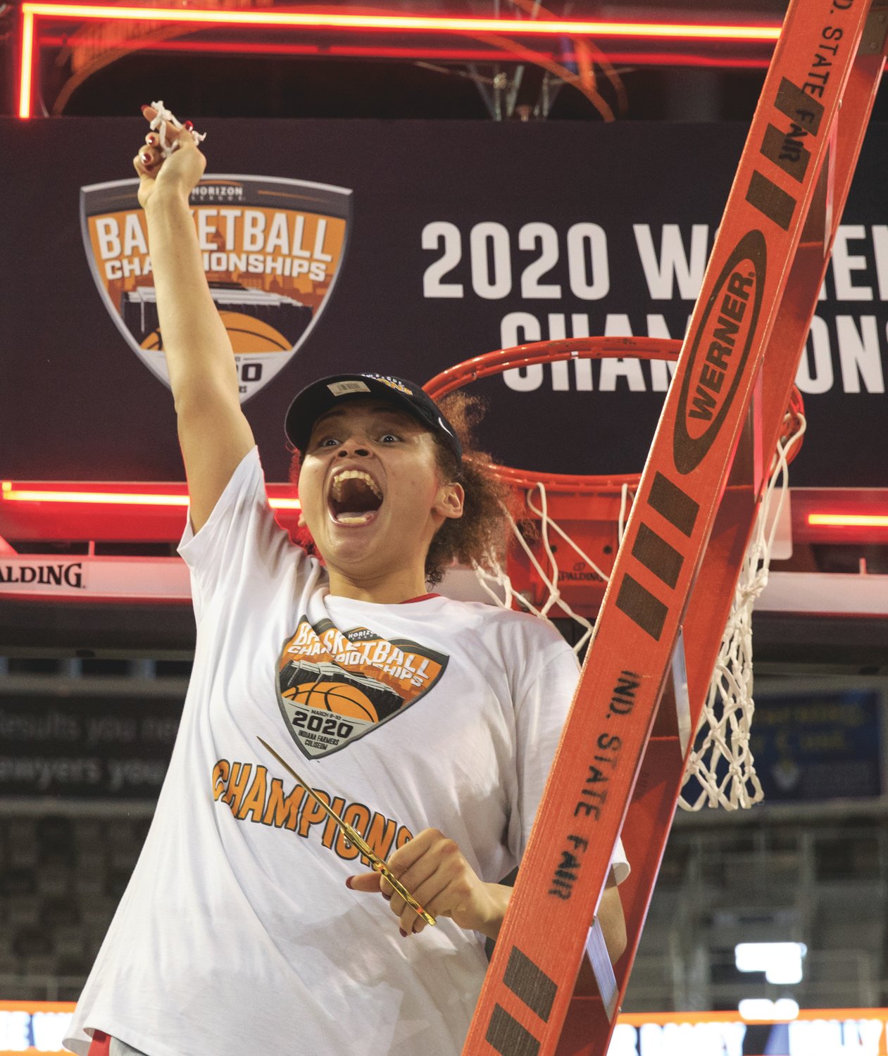 Fountain Central grad Macee Williams cuts down the nets after helping IUPUI win the Horizon League Championship.