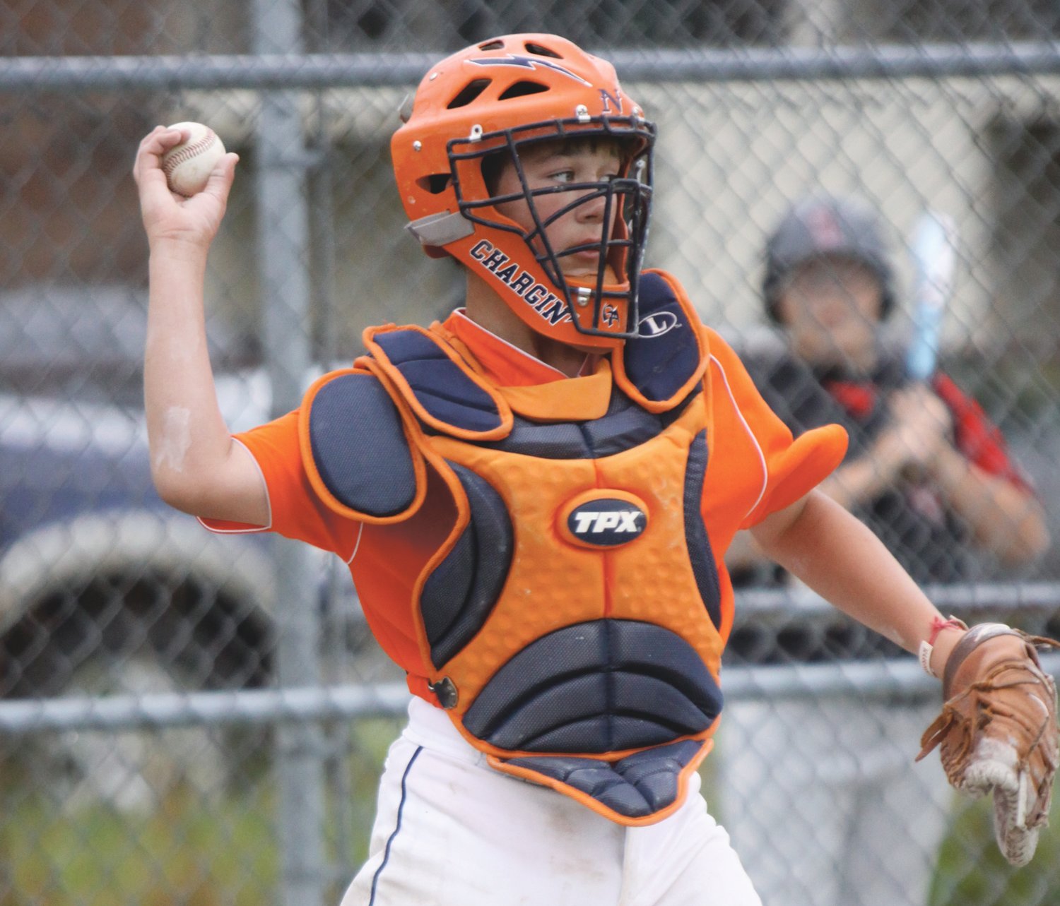 North Montgomery grad Baylee Adams tosses a ball back to the pitcher during a little league game more than 10 years ago. Adams saw his playing career end with the cancellation of the remainder of his senior season at Marian University.