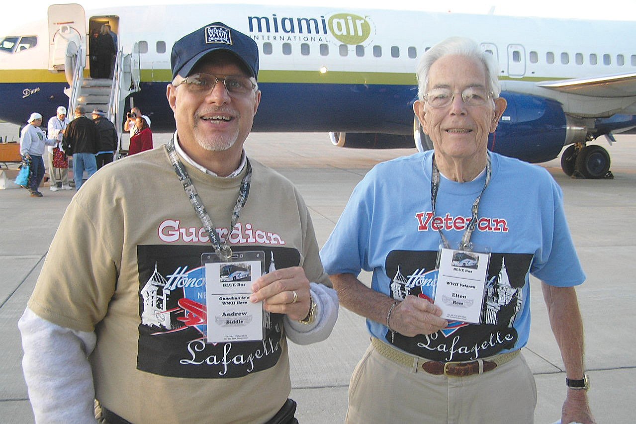 Andy Biddle, left, and Elton Ross prepare to board the Honor Flight to Washington, D.C.