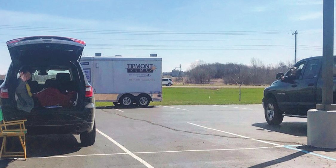 Northridge Middle School teachers Jodi Webster and Paul Greene take advtange of Wintek and Tipmont's free internet service by converting their vehicles into their virtual classrooms in the parking lot at North Montgomery High School.