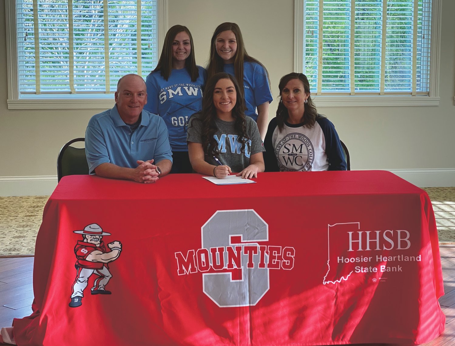 Southmont's Bailey Thompson will continue her golf career at St. Mary-of-the-Woods. She was joined by family and friends on Friday night to celebrate her commitment. PICTURED ABOVE: Thompson is joined by her parents Brian and Lori Thompson, and sisters Payton Jones (Thompson) and Hannah Thompson.