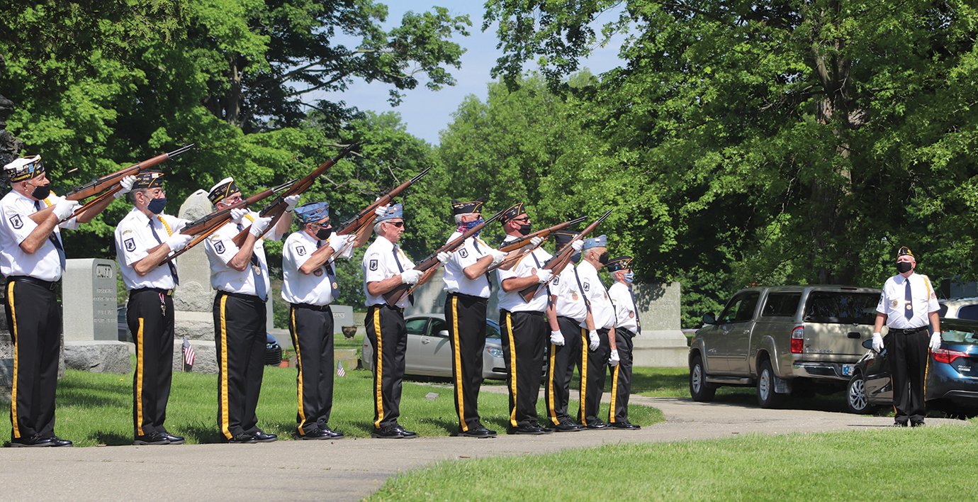 The traditional 21-gun salute in honor of fallen American military veterans is performed by members of Byron Cox American Legion Post #72 at Oak Hill Cemetery on Memorial Day.
