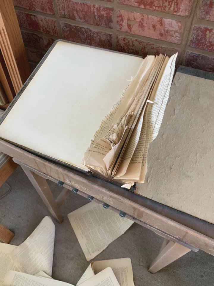 A Bible with torn-out pages sits in the sanctuary of Byron Christian Church. A 9-year-old boy and a 10-year-old girl have been arrested in connection with vandalizing the church.