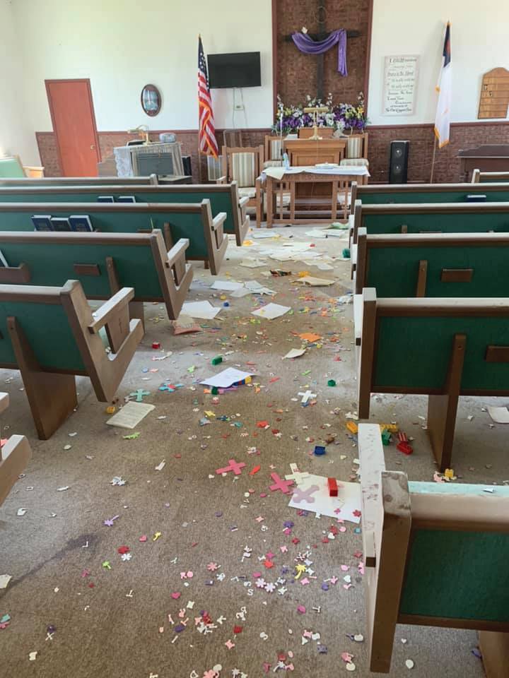 Craft supplies and paper lie strewn across the floor in the sanctuary of Byron Christian Church. Multiple rooms of the church were struck by vandals last week, and two children have been arrested in the case.