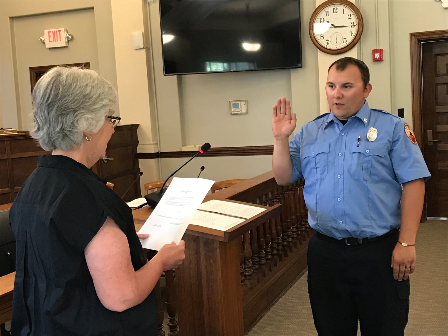Zachary Aveline is sworn to the Crawfordsville Fire/EMS Department by Crawfordsville Clerk-Treasurer Terri Gadd on Wednesday in the City Building.