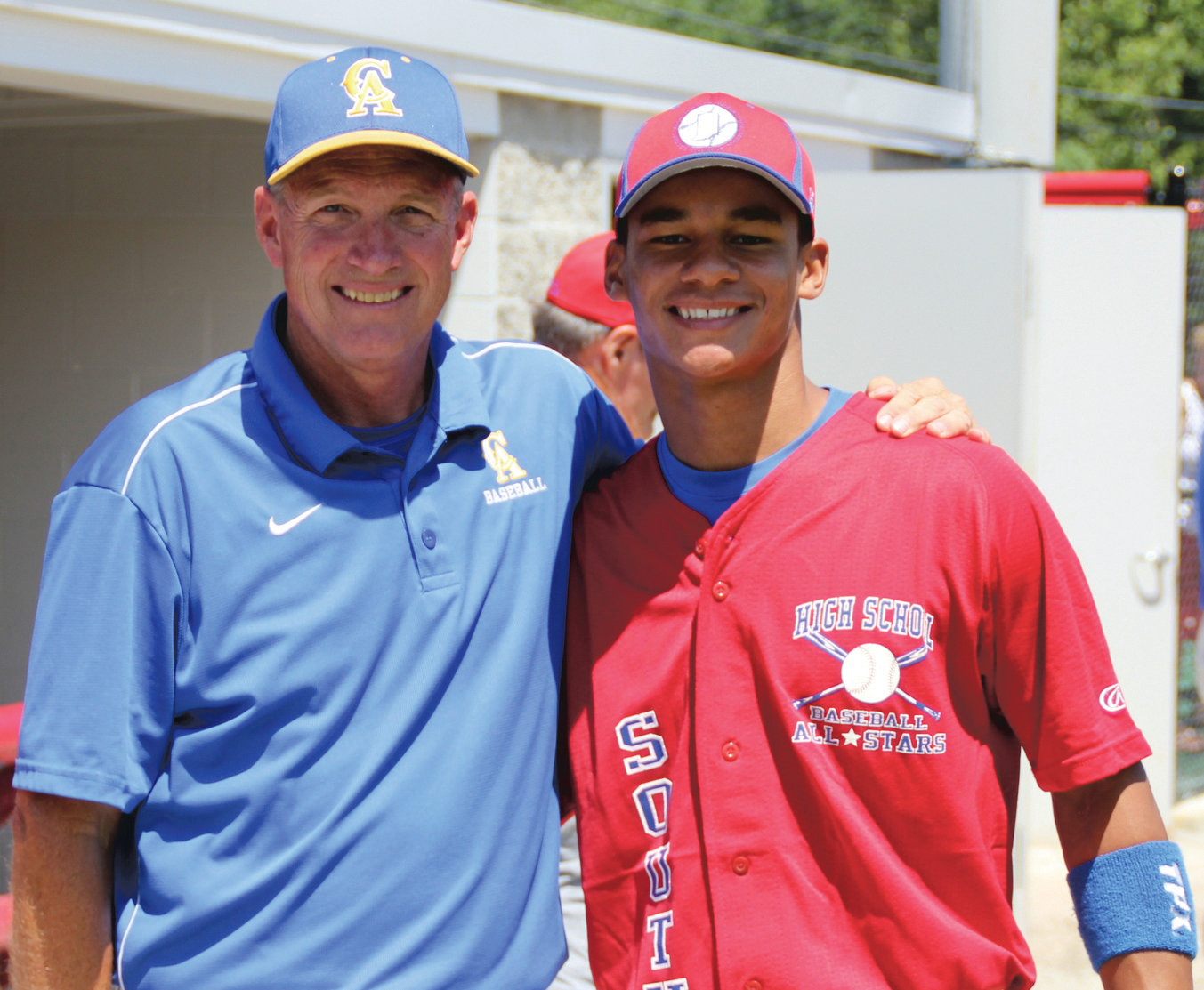 Jordan Jackson, right, was one of 13 Indiana North/South All Stars that John Froedge, left, coached in his 39-year career.
