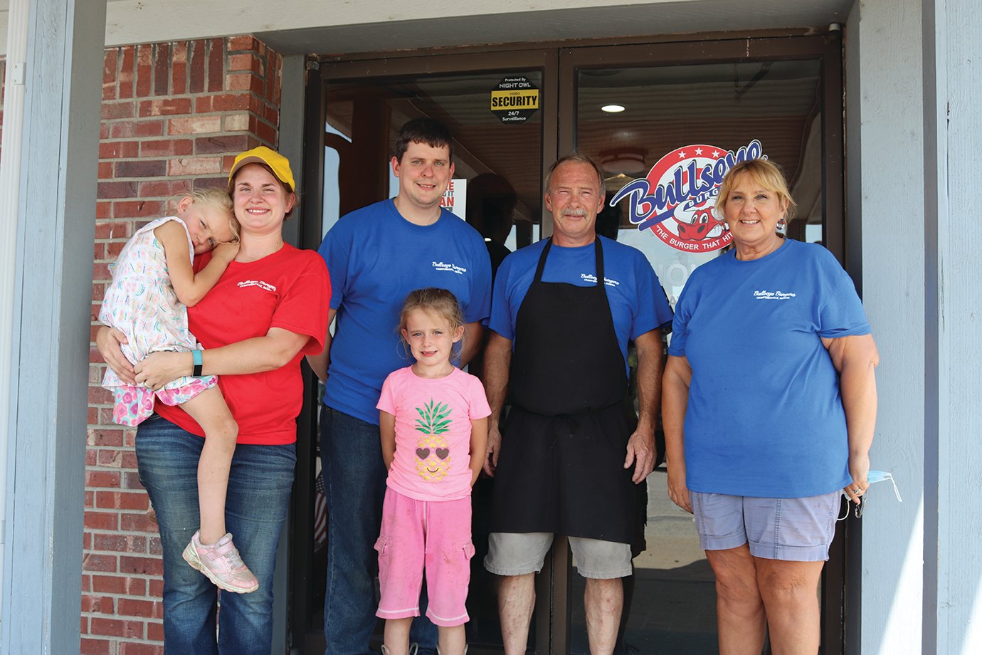 The Bullseye Burgers family stands tall outside the new restaurant on Darlington Avenue. The family includes Vera Carrell, from left, Lagora Carrell, Craig Carrell, Aaleeah Correll, Henry Carrell and Jeannie Thompson.
