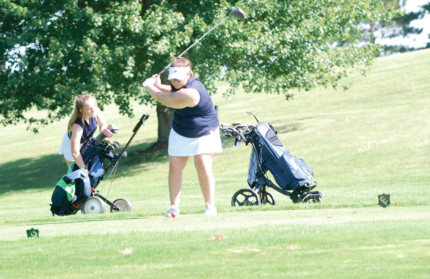 North Montgomery's Ella Stultz approaches her tee shot on No. 11 at the Crawfordsville Country Club Saturday afternoon. Stultz fired a 117 in the first meet of the season for the Chargers.