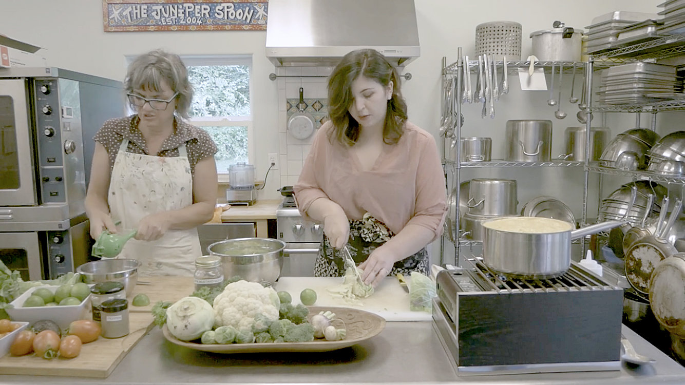 Lali Hess and Brittney Terry of The Juniper Spoon prepare a Costa Rican cabbage slaw.