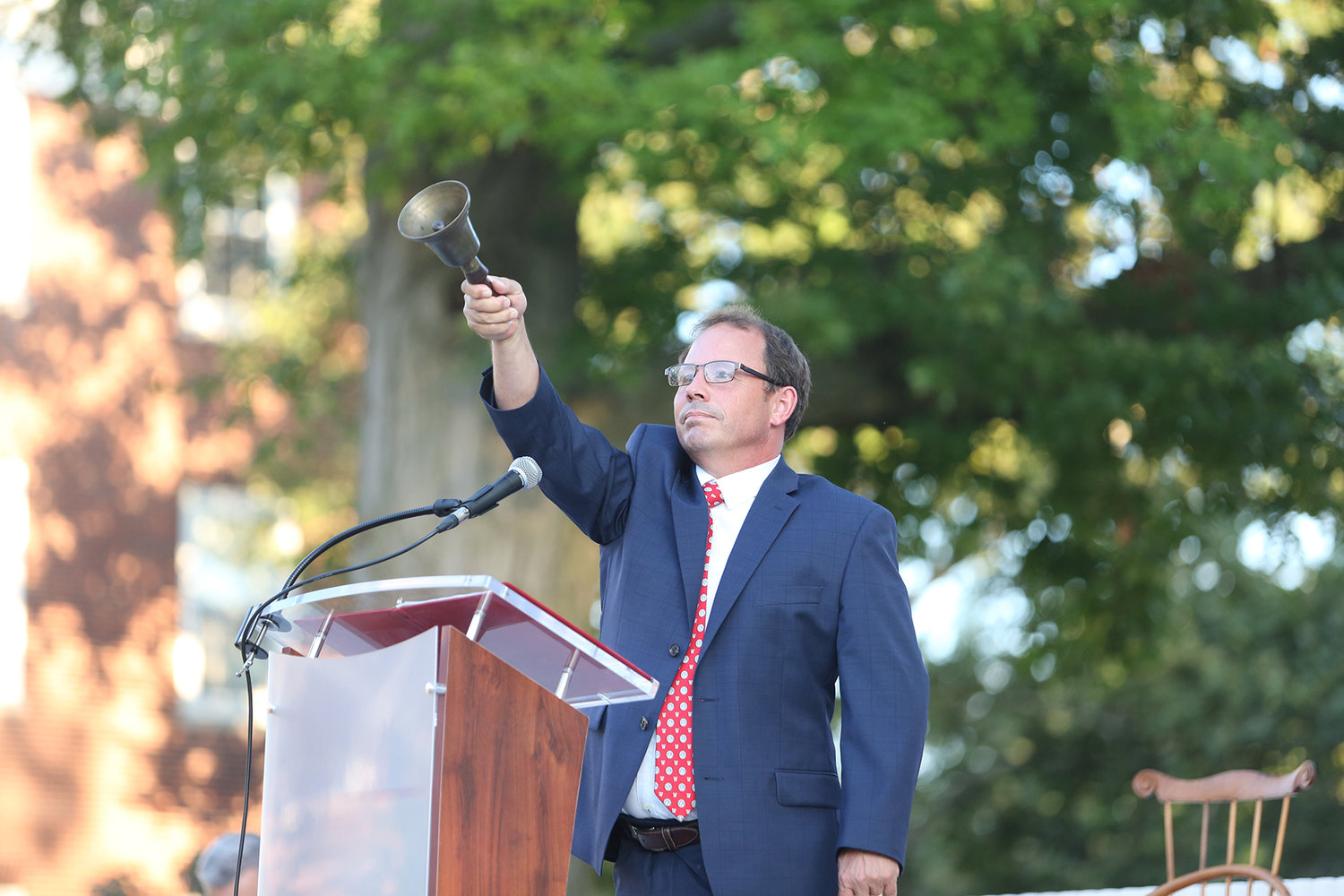New Wabash College President Scott Feller rings in the 255 young men from the Class of 2024 on Sunday on the College Mall.