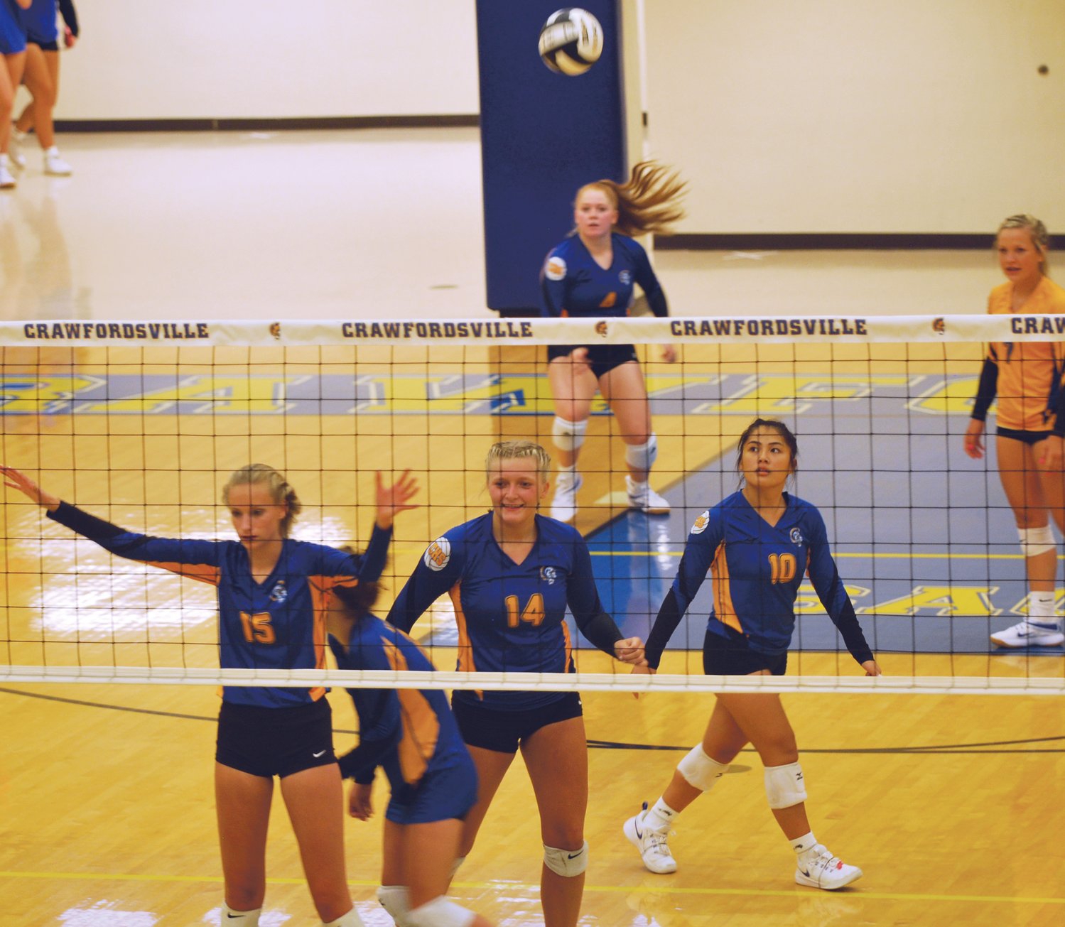 Crawfordsville's Laine Schlicher served 13 straight winners for the Athenians as they rattled off 13 straight points in the first game against Sheridan during a 3-0 win on Monday night.