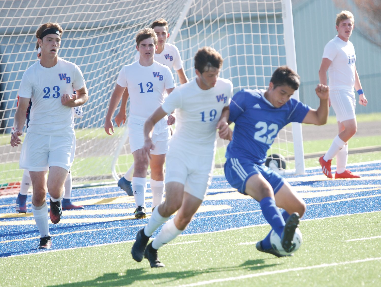 Edwin Gil-Herrera fights for position in Crawfordsville's win over Western Boone on Tuesday. The junior had a goal and an assist in the victory.