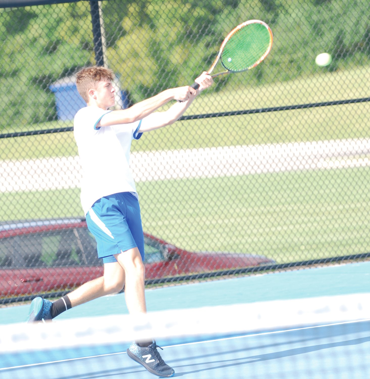 Crawfordsville No. 1 singles player Austin Motz returns a shot against Fountain Central's Cody Linville on Tuesday night.