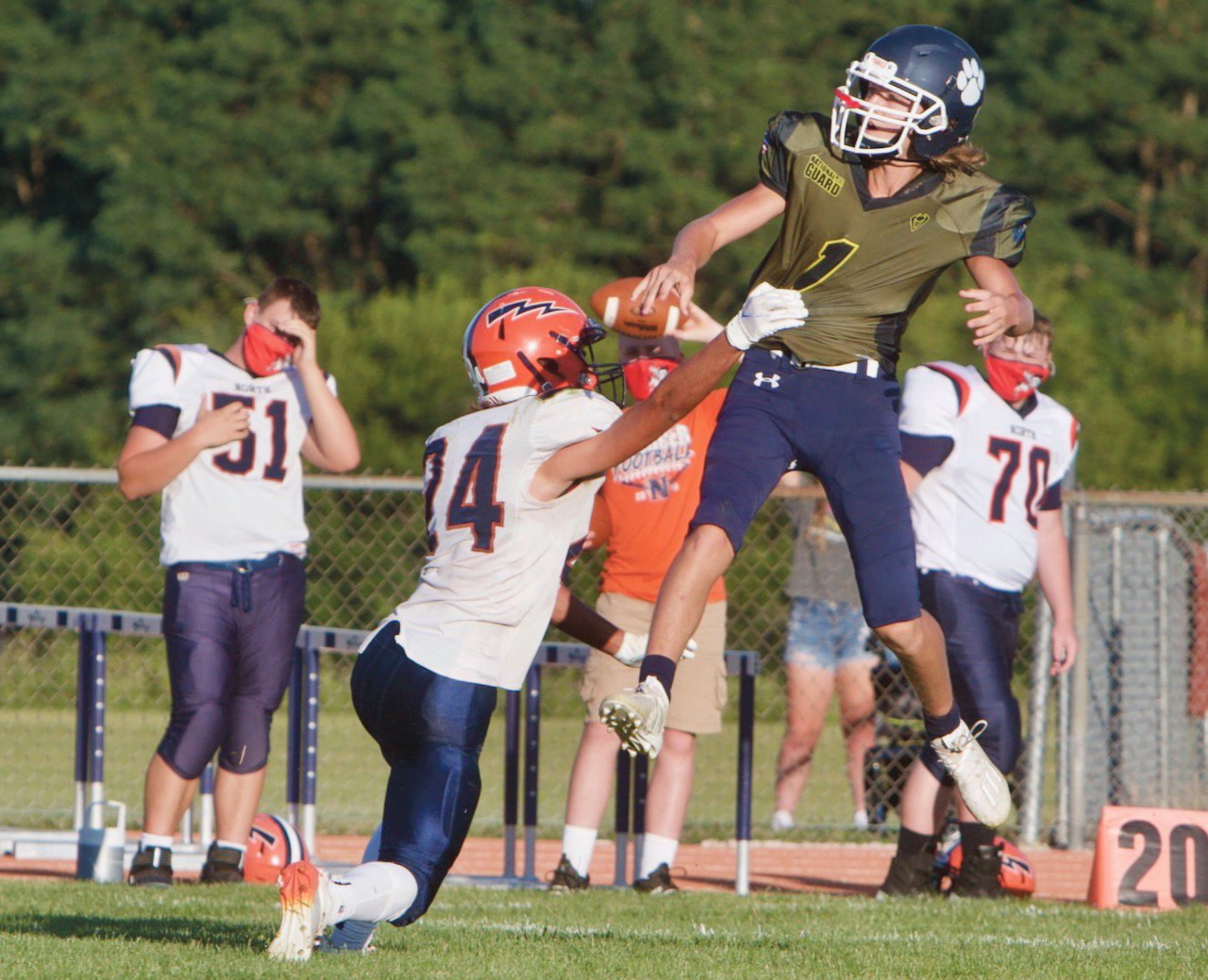 North Montgomery's Kolton Scrimager makes a one-handed grab to stop the opposing QB.