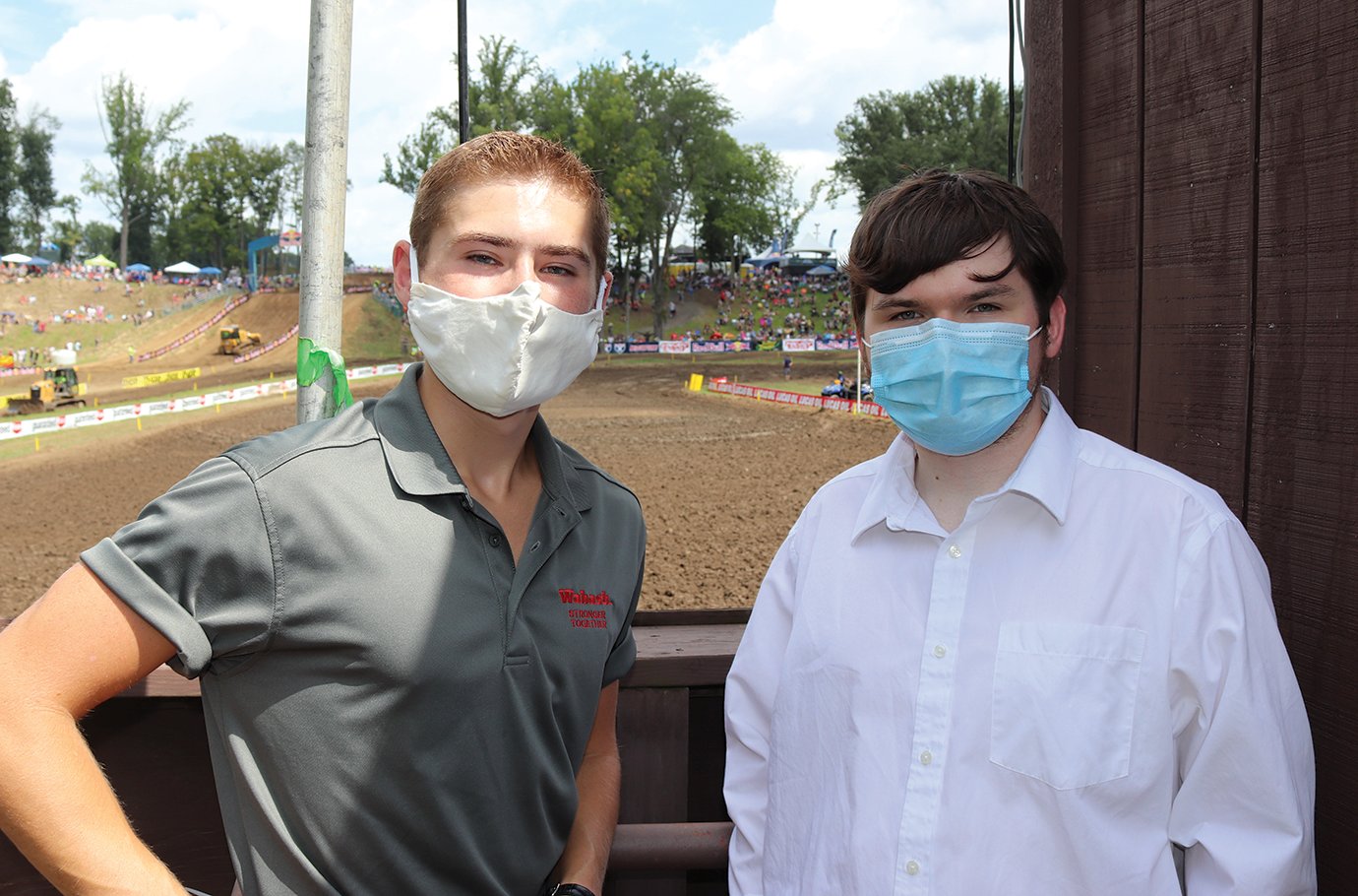 Wabash juniors Will Borland, left, and Austin Coon prepare to sing the National Anthem at Ironman Raceway on Saturday.