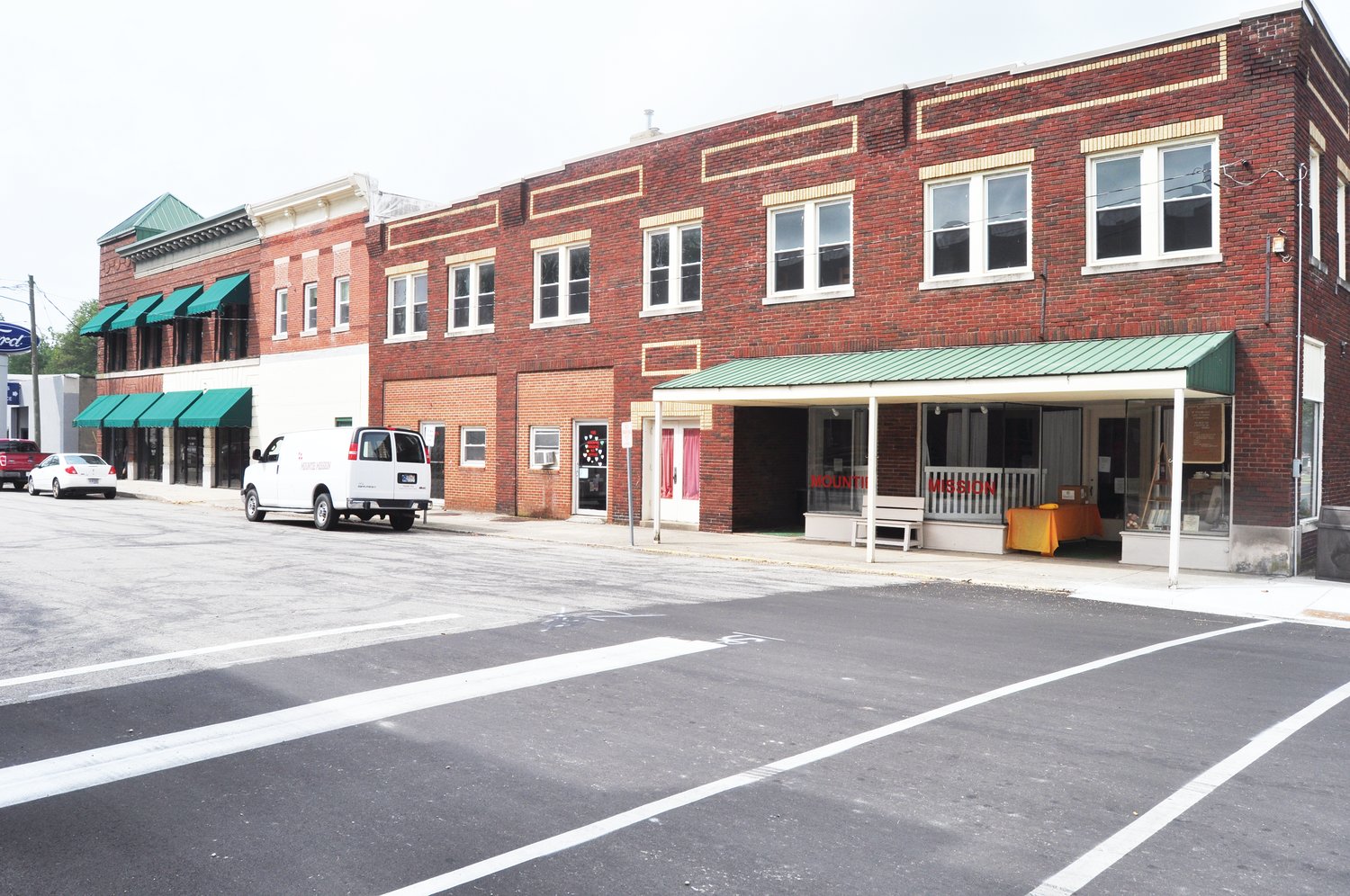 Mountie Mission, which operates from the corner of Washington and Main streets in downtown Ladoga, plans to expand into the building with the green awnings.