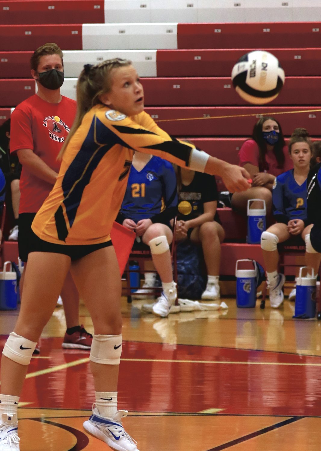 Olivia reed returns a ball for Crawfordsville against Attica this season.