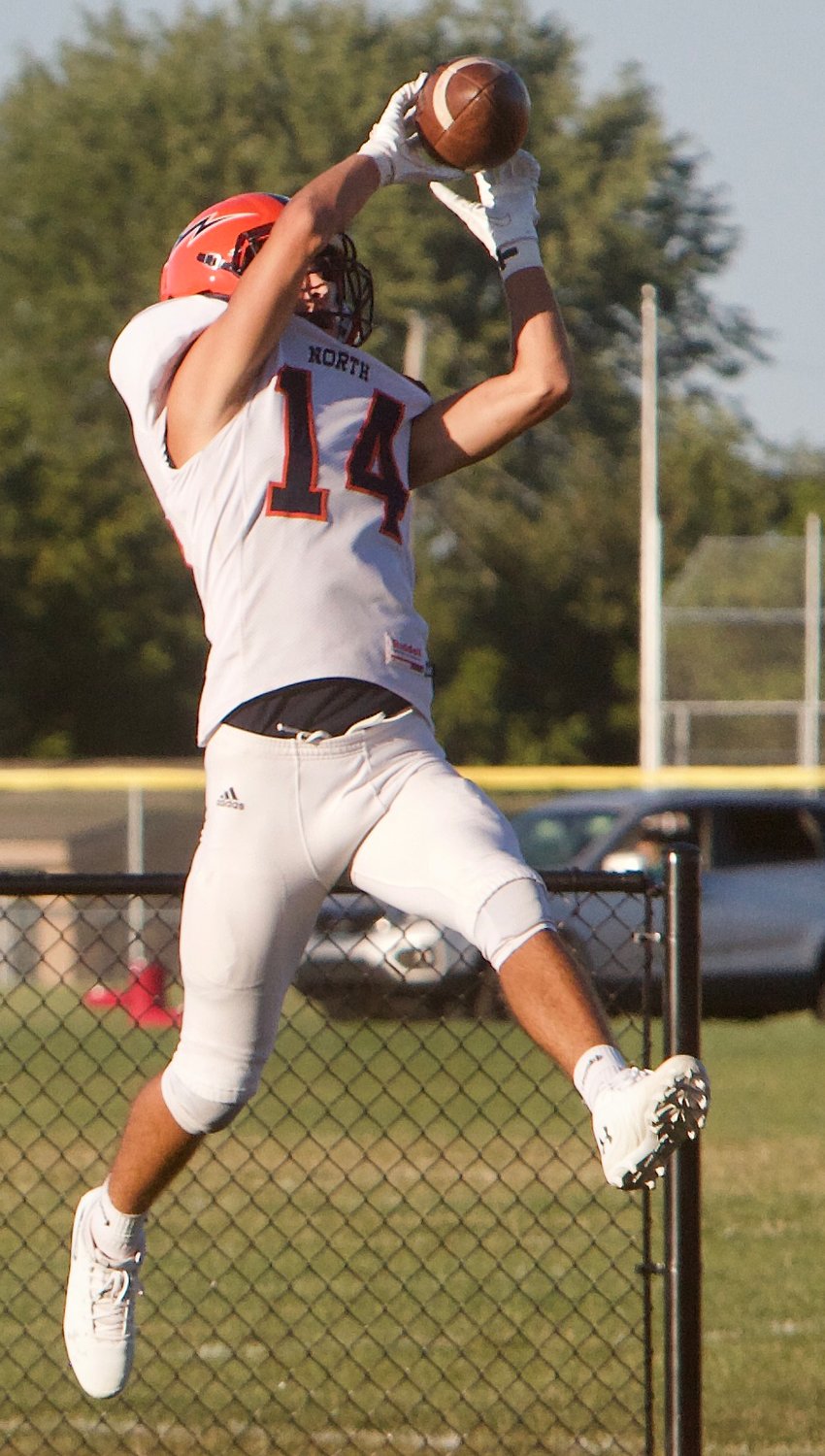 North Montgomery's Kolton Scrimager snags a pass for the Chargers.