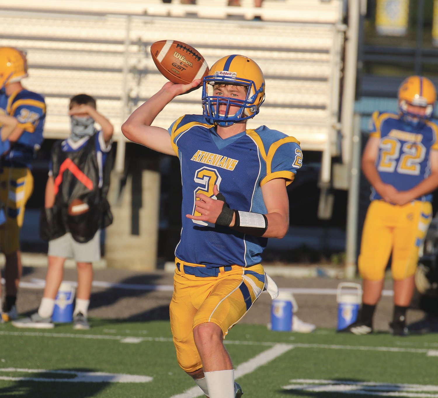 Kaiden Underwood fires a pass in the Athenians' 48-14 loss to Western Boone on Friday.