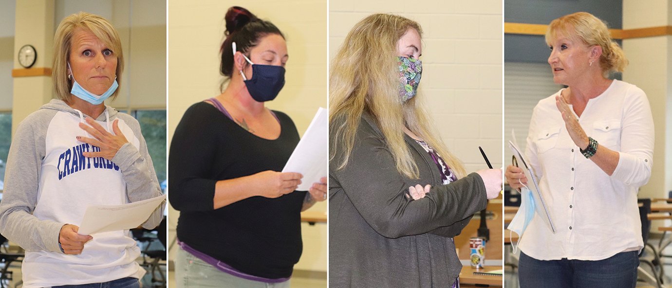 Erica Minnette, from left, Angelina Ball, Emily Race and Sharon Olsen deliver impassioned speeches during Crawfordsville Schools' Thursday night meeting at the middle school.