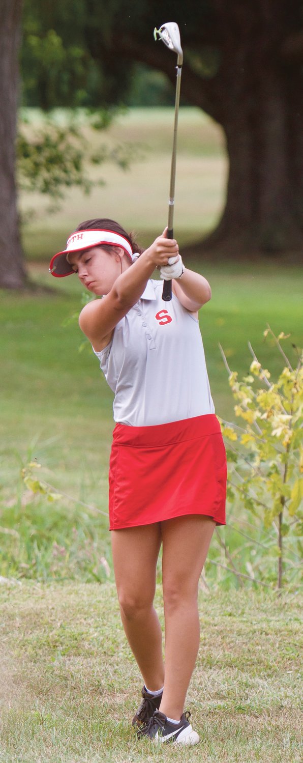 Southmont's Taylor Grino hits an iron shot out of the rough on Wednesday at Crawfordsville Municipal Golf Course.