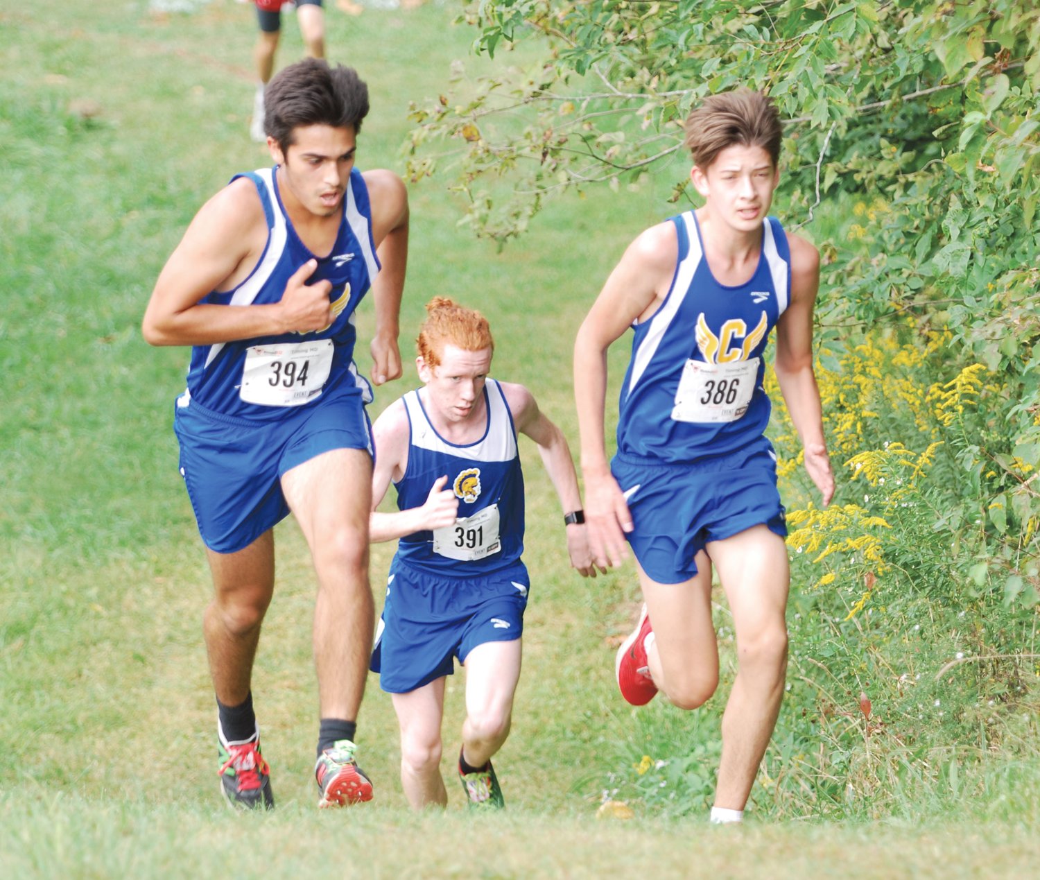 Crawfordsville's Arthur Ruano, Peter Kearns, and Roman Contreras climb the hill at Southmont during the Montgomery County meet on Thursday.