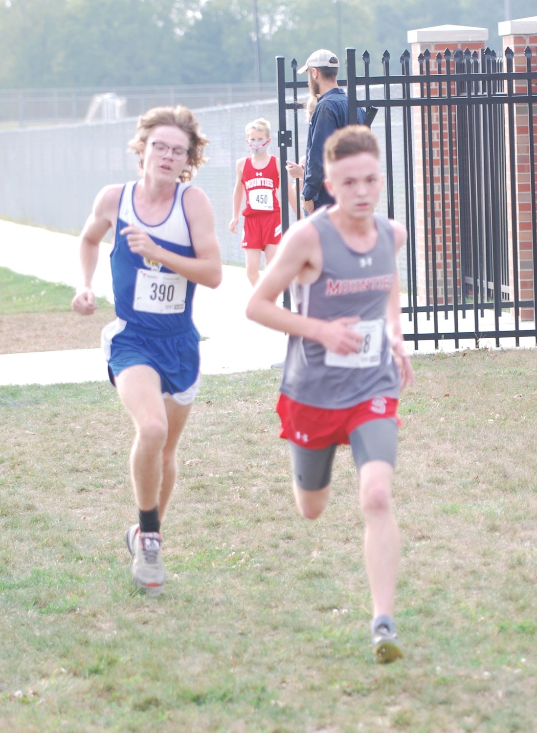 Crawfordsville's Hunter Hutchison and Southmont's Mason Cass were neck and neck on Thursday night before Hutchison passed Cass in the final 50 meters to win the Montgomery County meet with a time of 17:55.