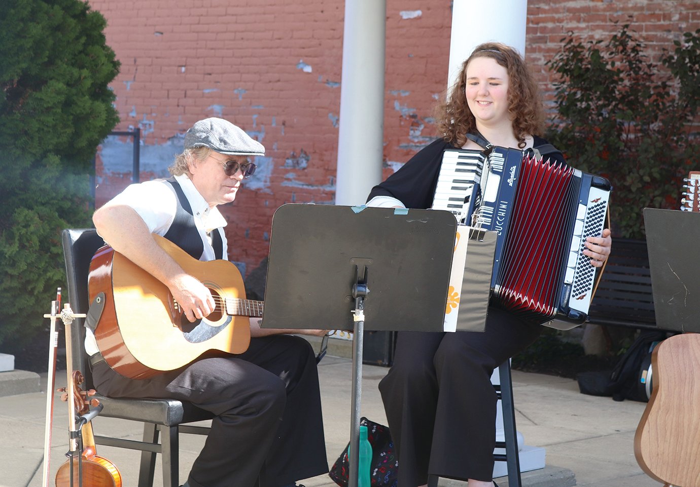 Bal-Hinch Bunch members Clayton Peters and Josie Beach provide some easy listening for patrons of Lunch on the Plaza on Friday.