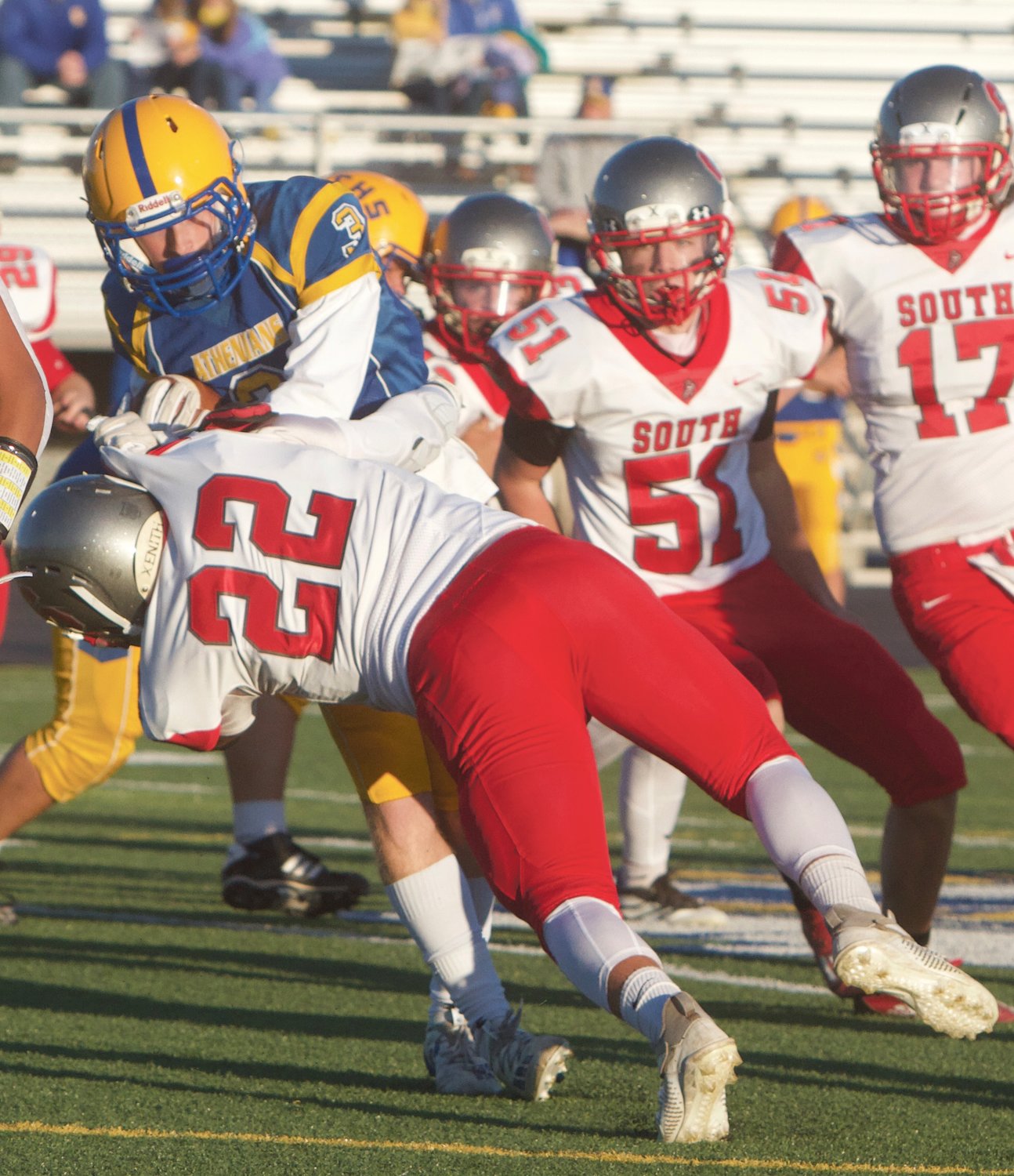 Southmont's Wyatt Woodall makes a diving tackle against Crawfordsville.