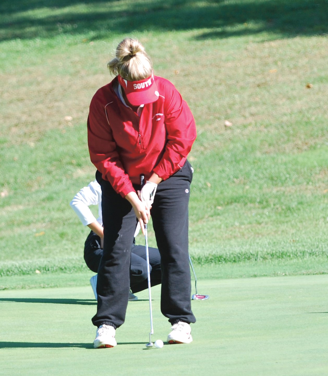 Southmont's Macie Shirk lines up a putt at the sectional on Saturday. The junior advanced to the regional as an individual with a round of 95.
