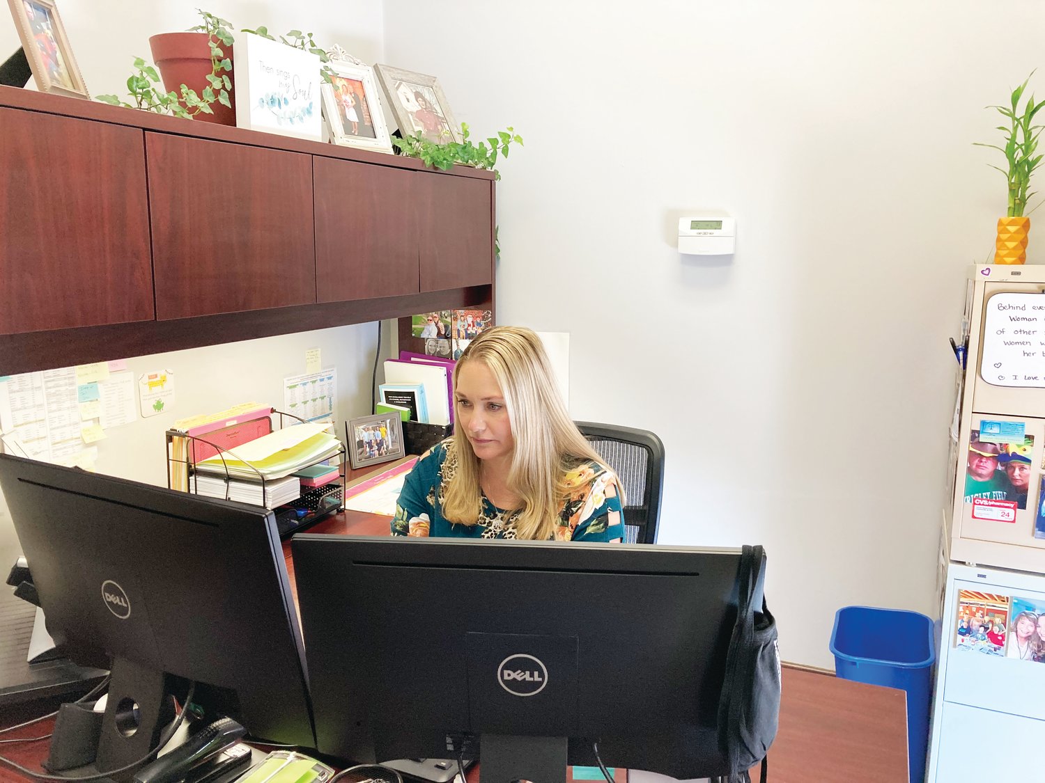 Linda McAnulty, Superior Court court reporter, works at her desk. The court's criminal caseload has jumped in recent years due to an increase in drug cases.