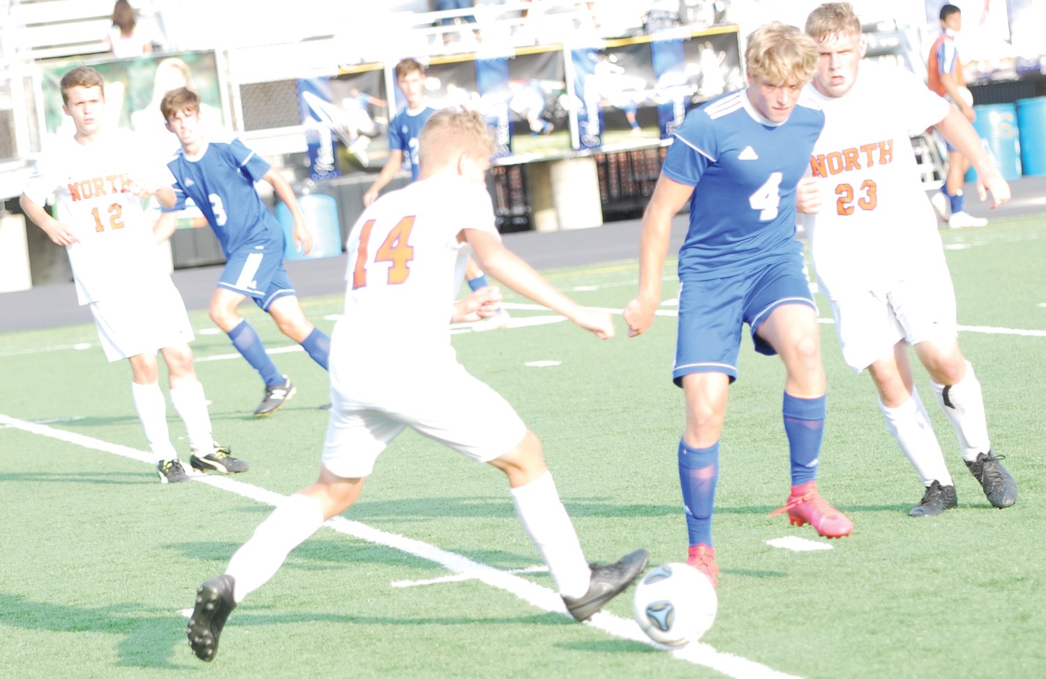 Crawfordsville's Eli Reeves fights for possession with North Montgomery's Caleb Hunsberger.
