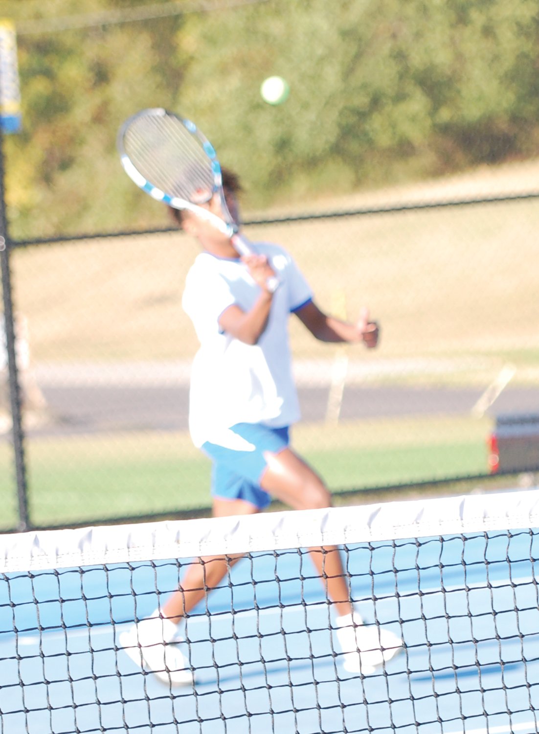 Crawfordsville’s Ziair Morgan returns a shot at No. 1 doubles for the Athenians on Wednesday against North Montgomery.