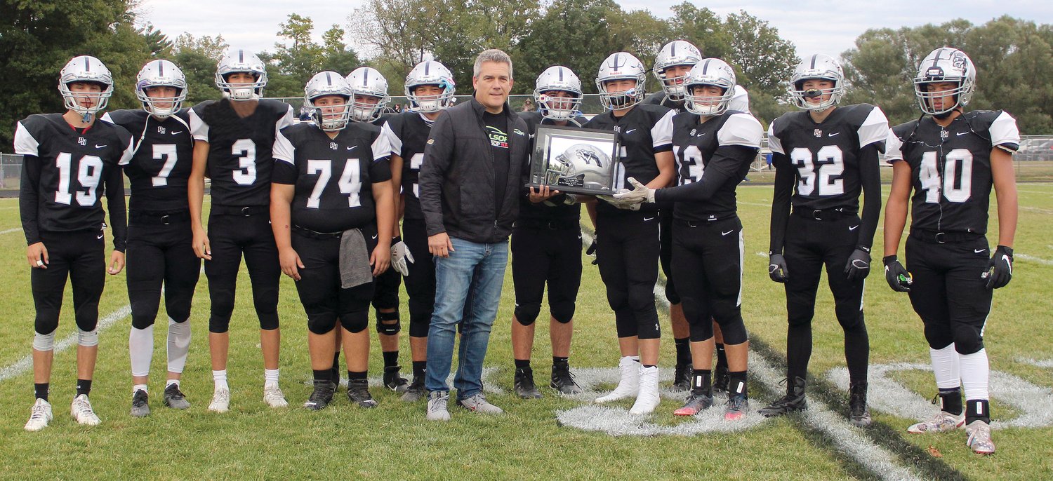 Presenting the special token to Mike Alsop were the football seniors including Jake Roberts, Ozzy Jones, Riley Ferguson, Logan Girdler, Jentre Jeffers, Ty Buell, Mike Alsop, Louis Monik, Reece Simpson, Roger Crowder, Kayleb Price, Jacob Ramsay and Quinton Hanks.