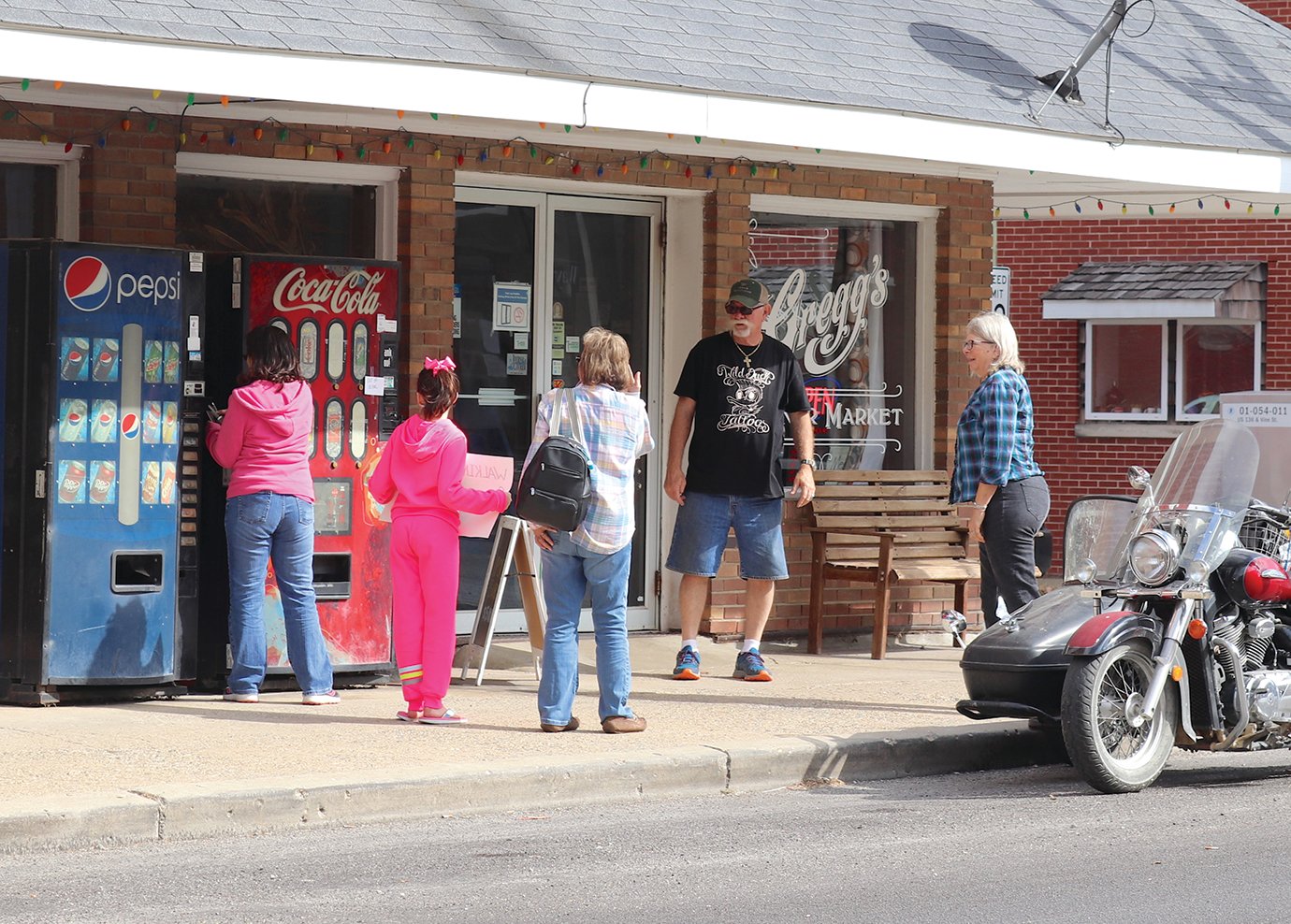Even a quick stop for a drink can be an opportunity to raise awareness for breast cancer, exemplified Monday near the entrance of Gregg's Corner Market in Waynetown.