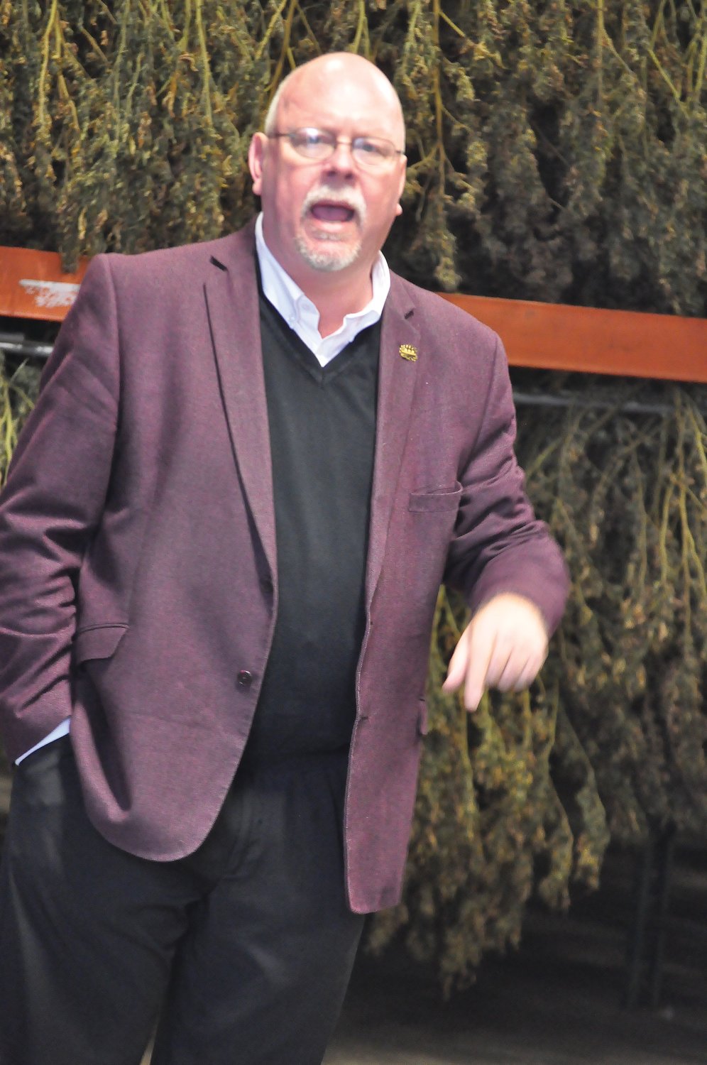 Donald Rainwater speaks Monday at Heritage Farmacy. The Libertarian candidate for Indiana governor called for the legalization of medical and recreational cannabis during an appearance at the local hemp farm.