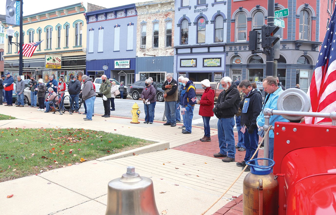 The intersection of Main and Green streets is lined with residents eager to show their appreciation for the country's fallen soldiers Wednesday at Canine Plaza during the annual Veterans Day ceremony.