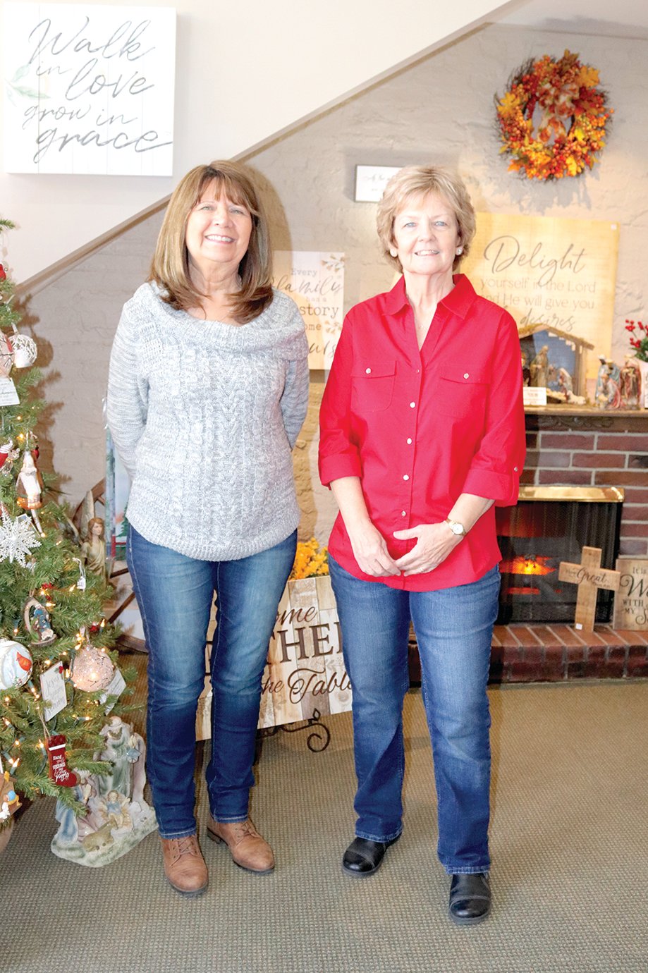 In His Time owner Jaci Cox, from left, and manager Brenda Spencer welcome holiday shoppers to their downtown Crawfordsville storefront Friday afternoon.